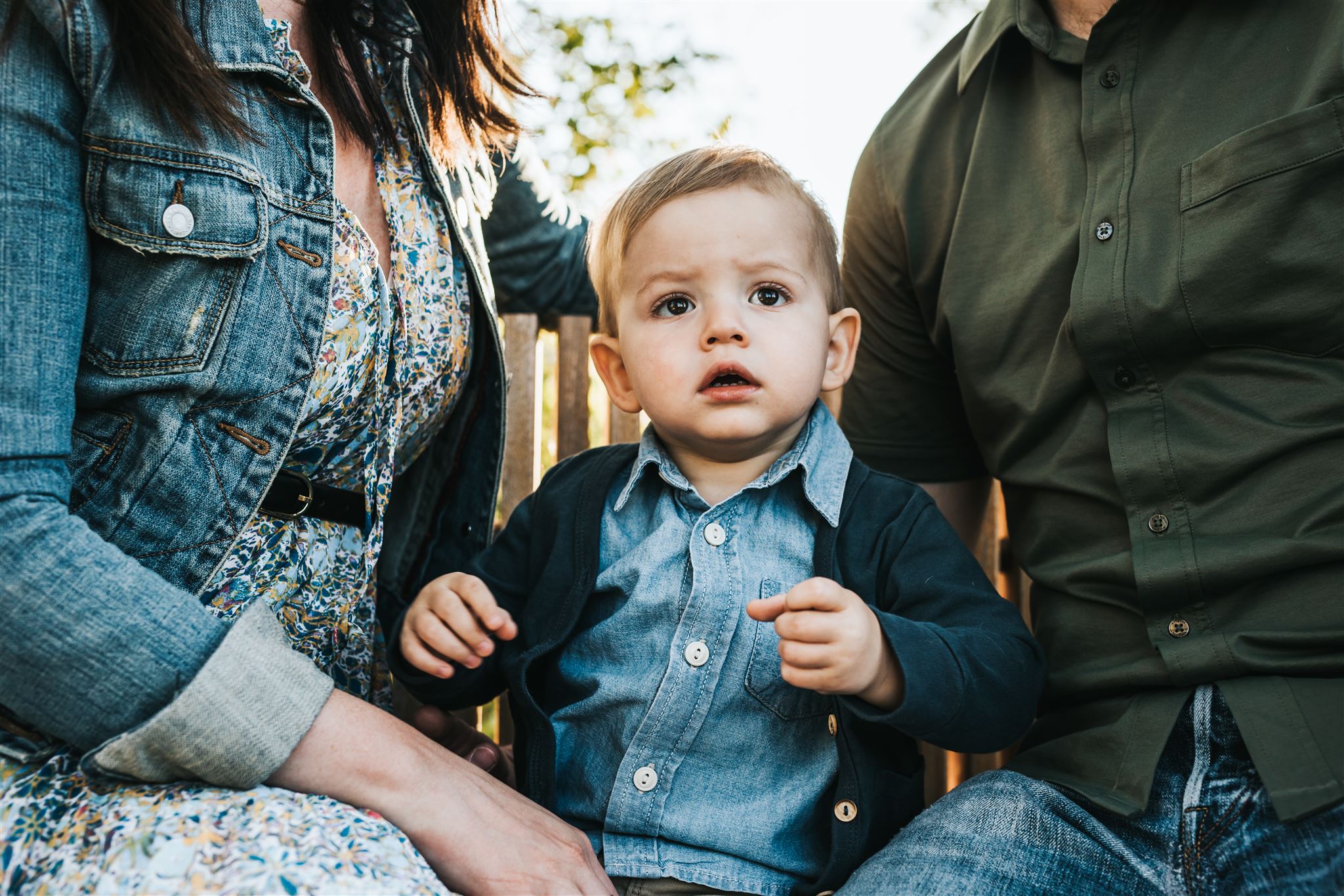 Parents with little boy in East Village Calgary for family session