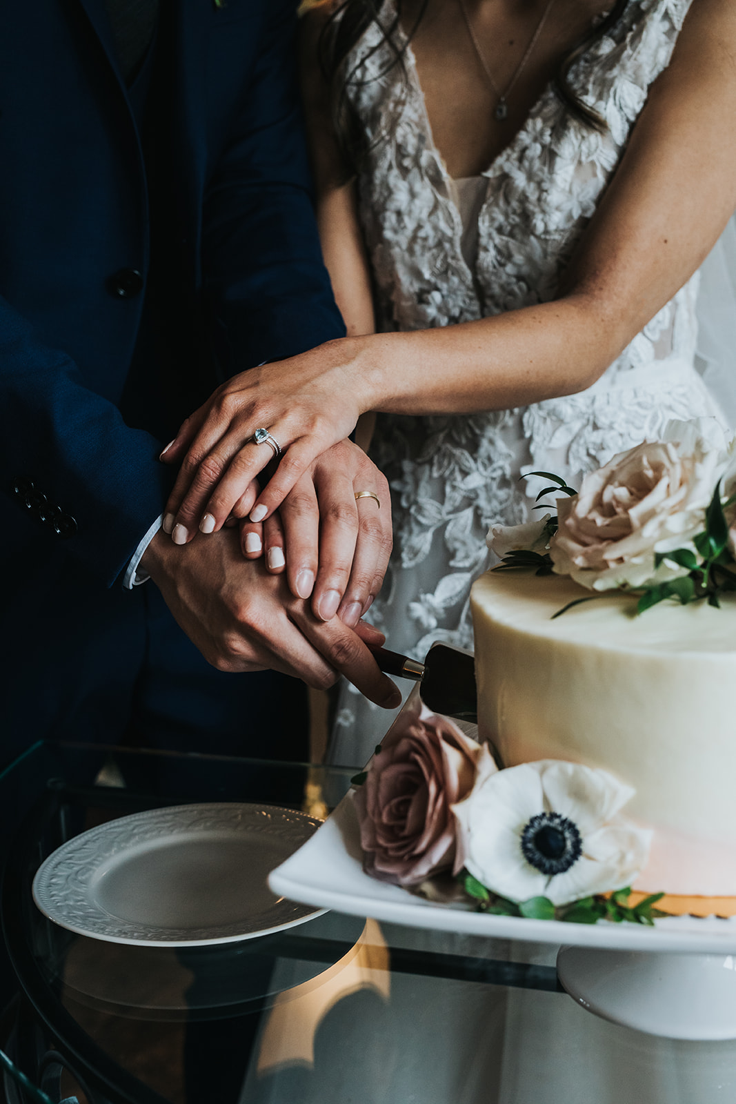 Bride and Groom cutting wedding cake