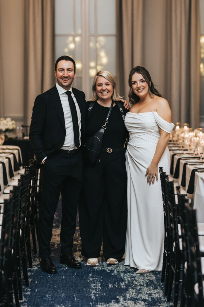 Calgary Wedding Photographer Sue Moodie Photography with her clients, a bride and groom at their Fairmont Palliser Hotel November wedding